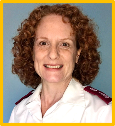 Smiling woman in uniform