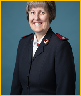 Smiling woman in uniform