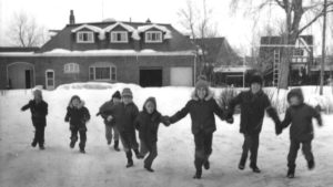 Children playing in front of Broadview Village Children's Home