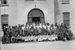 Rows of children in front of a Canadian residential school