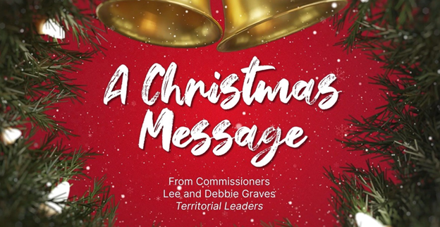 Festive image with two golden bells and green foliage on a red background. Text reads: A Christmas Message from Commissioners Lee and Debbie Graves, Territorial Leaders.